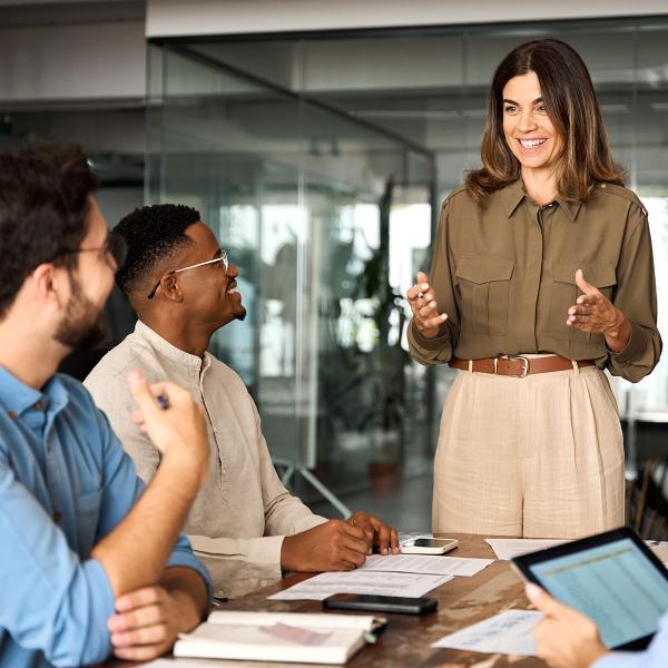 A woman leading a collaborative meeting
